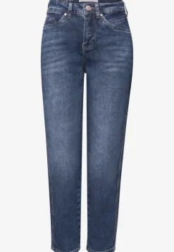 Jeans à jambes barrées