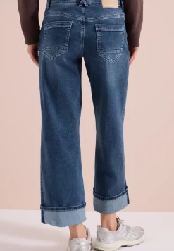Jeans jambes larges à taille haute et coupe slim