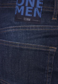Jean slim à délavage rinsed