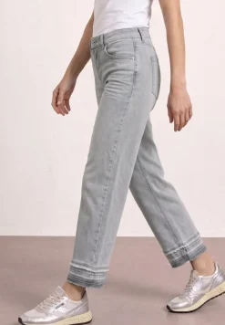 Jeans Straight Leg avec ourlet décoratif