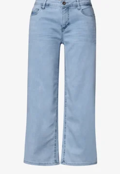 Jean taille moyenne à jambes larges, coupe loose