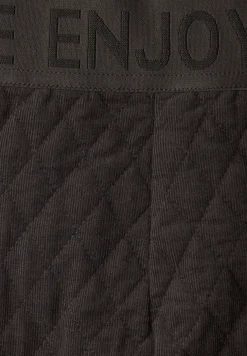 Jupe avec motif piqué