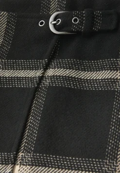 Jupe à carreaux en optique cache-cœur