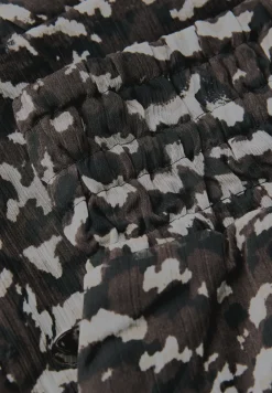 Jupe en mousseline de soie à motifs