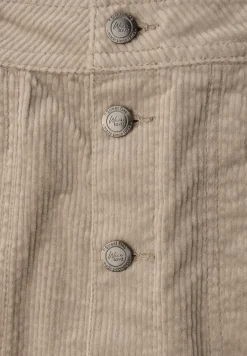 Jupe en velours côtelé avec patte de boutonnage