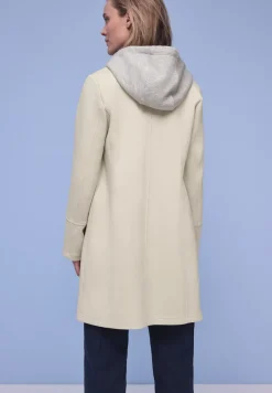 Manteau avec incrustation