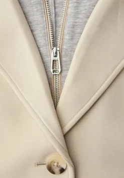 Manteau avec incrustation