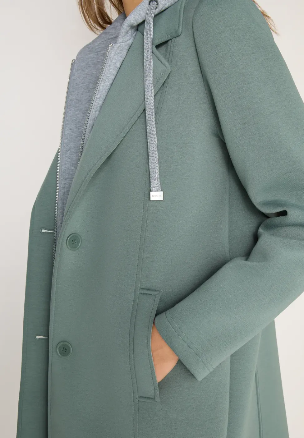 Manteau avec incrustation de sweat
