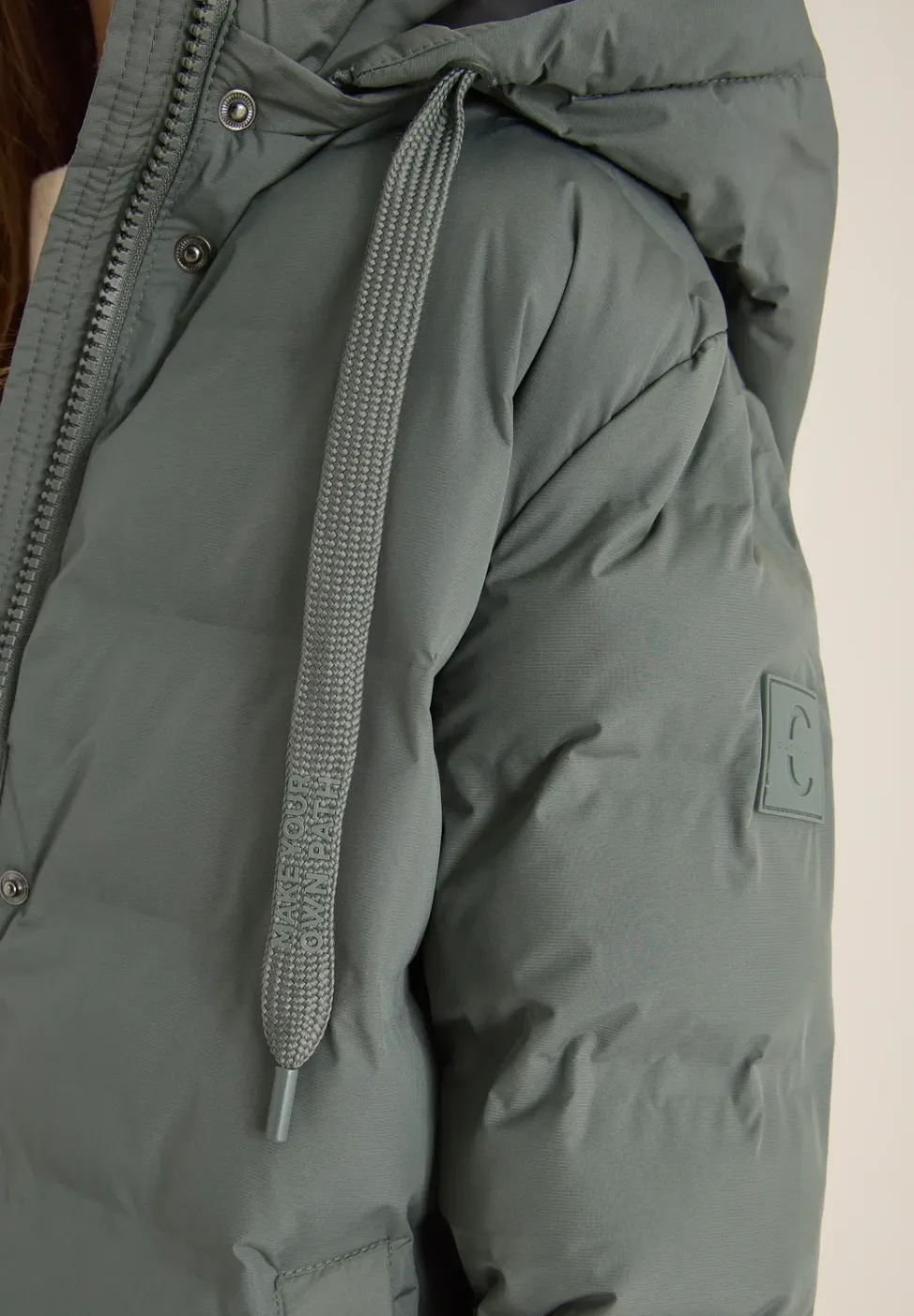 Manteau avec matelassage sans coutures