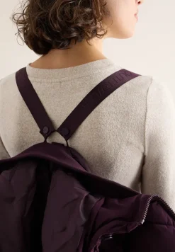 Manteau avec sac à dos Strings