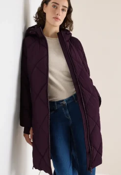 Manteau avec sac à dos Strings