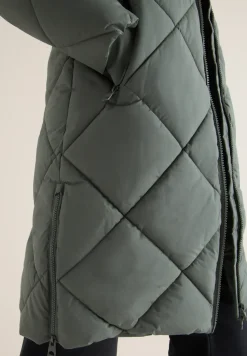 Manteau avec sac à dos Strings