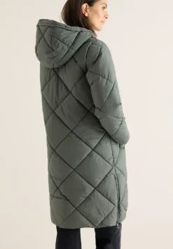 Manteau avec sac à dos Strings
