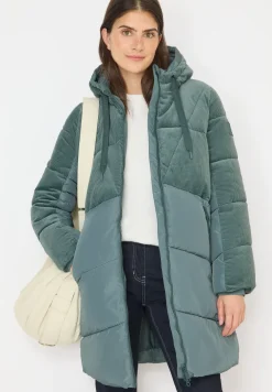 Manteau bouffant avec mélange de velours côtelé