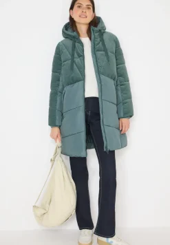 Manteau bouffant avec mélange de velours côtelé