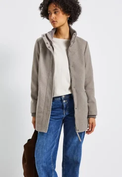 Manteau court avec détails en tricot
