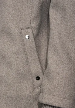 Manteau court avec détails en tricot