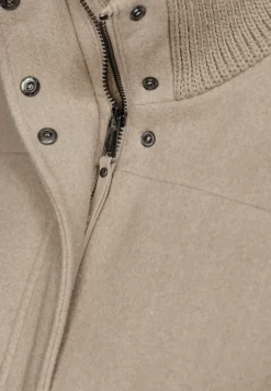 Manteau court avec détails en tricot