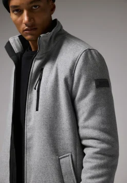 Manteau en optique laine