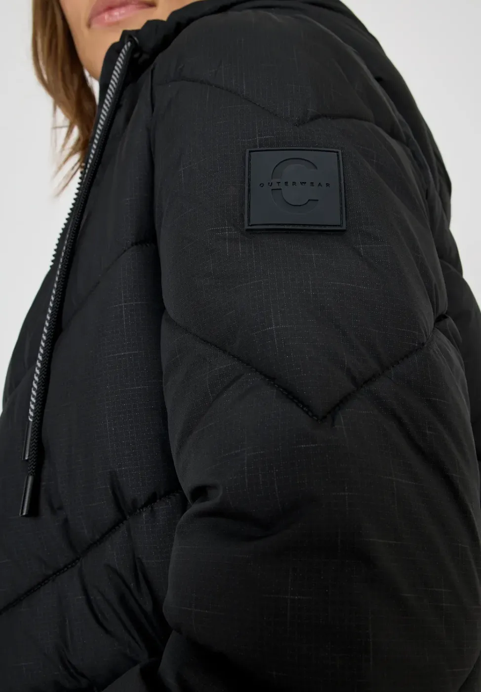 Manteau matelassé avec capuche