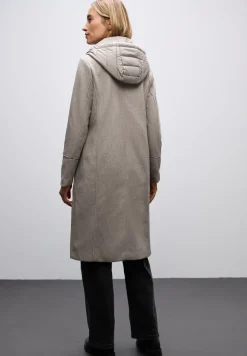 Manteau à revers avec incrustation
