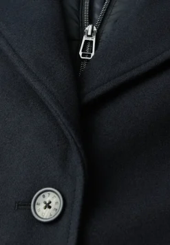 Manteau à revers avec incrustation