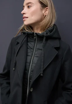 Manteau à revers avec incrustation