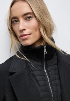 Manteau à revers avec incrustation