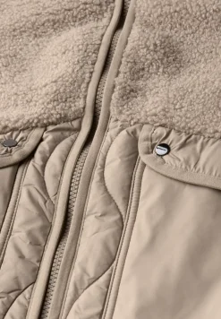 Manteau à structure mixte
