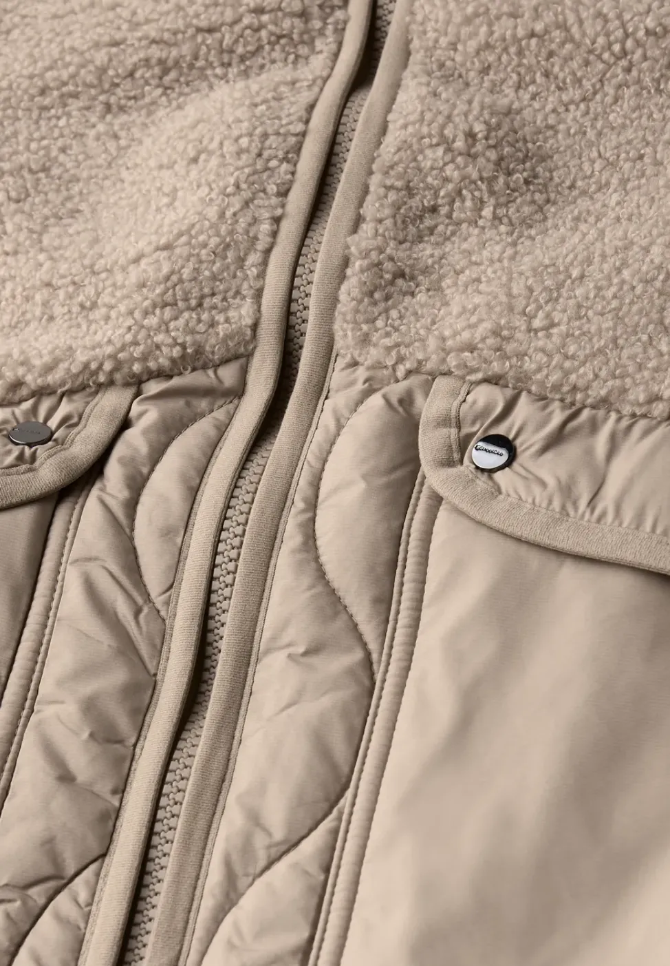 Manteau à structure mixte