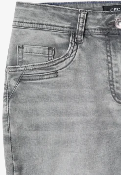 Mid Waist Slim Leg Jeans dans un Casual Fit