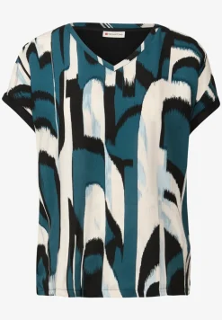 Mélange de matériaux pour la chemise à col en V