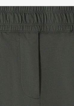 Pantalon ajusté taille mi-haute coupe slim