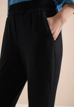 Pantalon ajusté taille mi-haute coupe slim