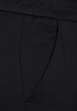 Pantalon coupe ample