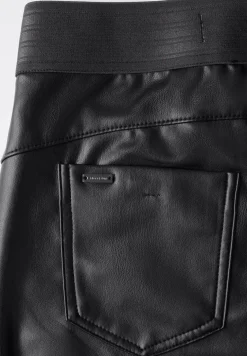Pantalon enduit