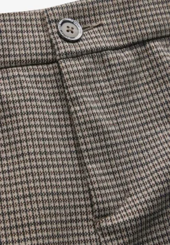 Pantalon large à carreaux