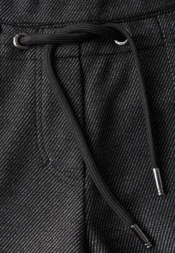 Pantalon à motifs