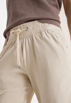 Pantalon taille mi-haute coupe slim