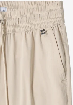 Pantalon taille mi-haute coupe slim