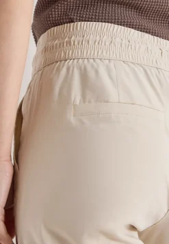 Pantalon taille mi-haute coupe slim