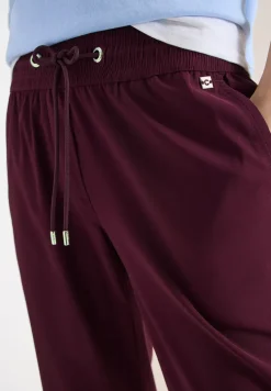 Pantalon taille mi-haute coupe slim