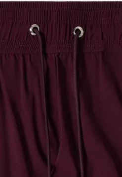 Pantalon taille mi-haute coupe slim
