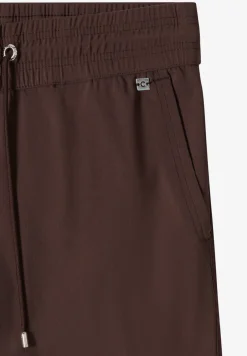 Pantalon taille mi-haute coupe slim
