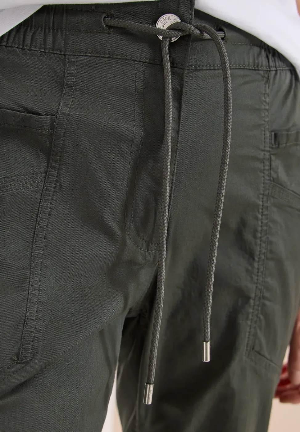 Pantalon taille mi-haute à coupe slim avec effet délavé