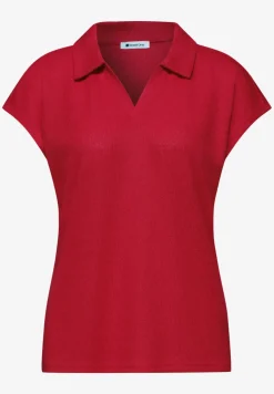 Polo à épaules droppées en tricot