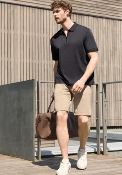 Polo à manches courtes avec fermeture zip