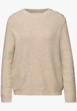 Pull avec détail de boutons