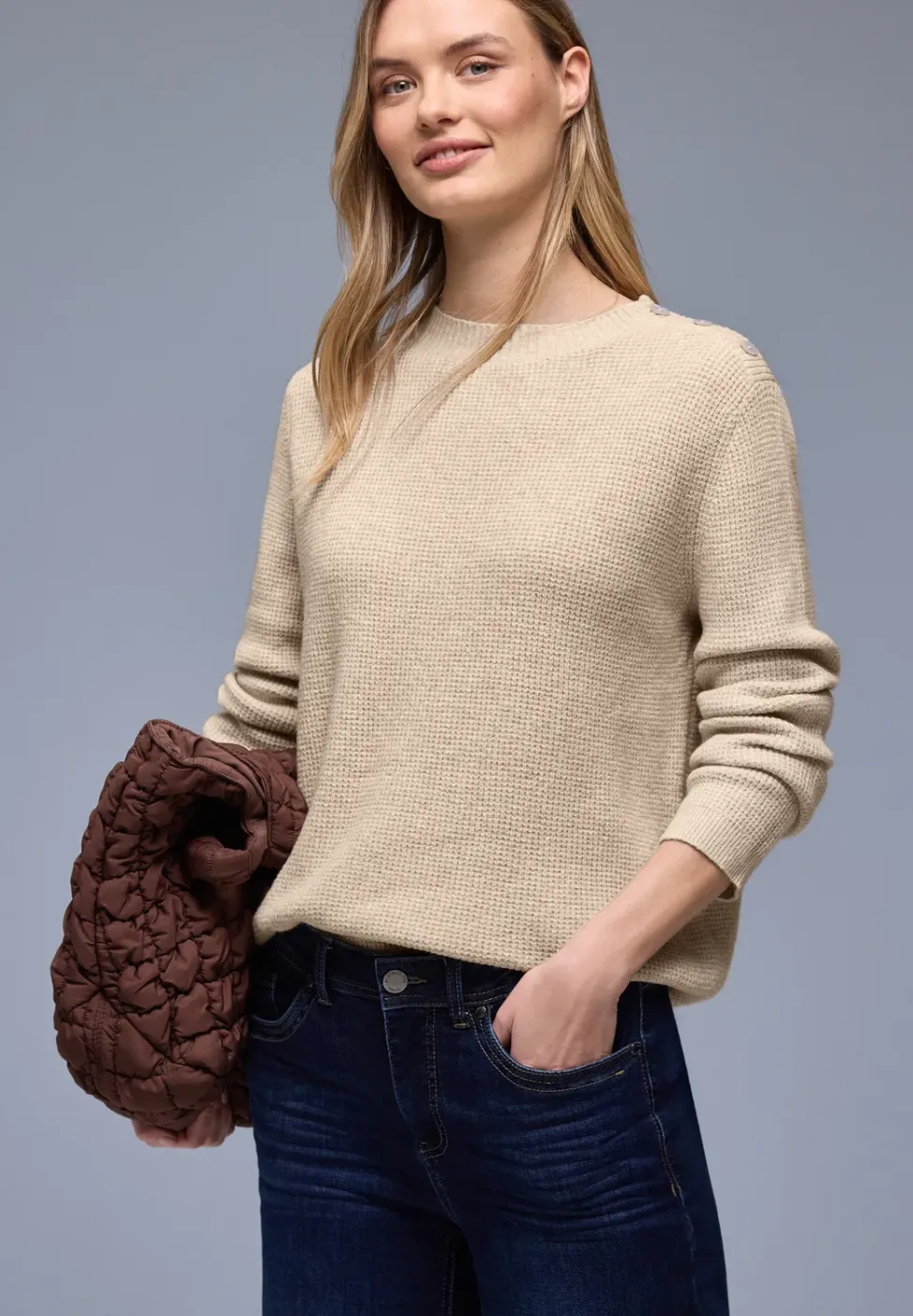 Pull avec détail de boutons