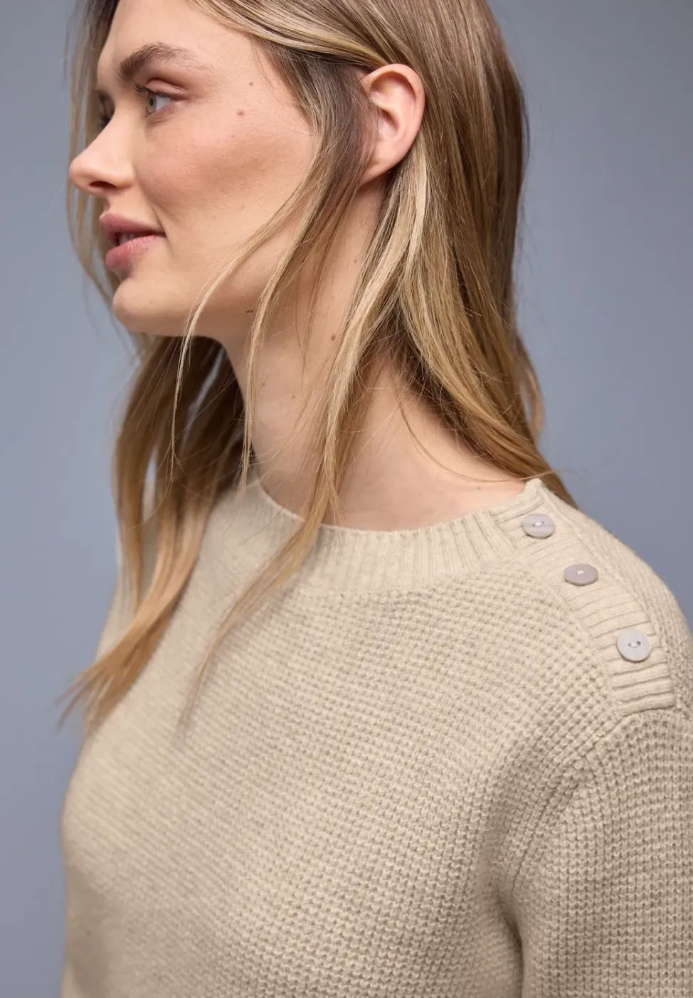 Pull avec détail de boutons